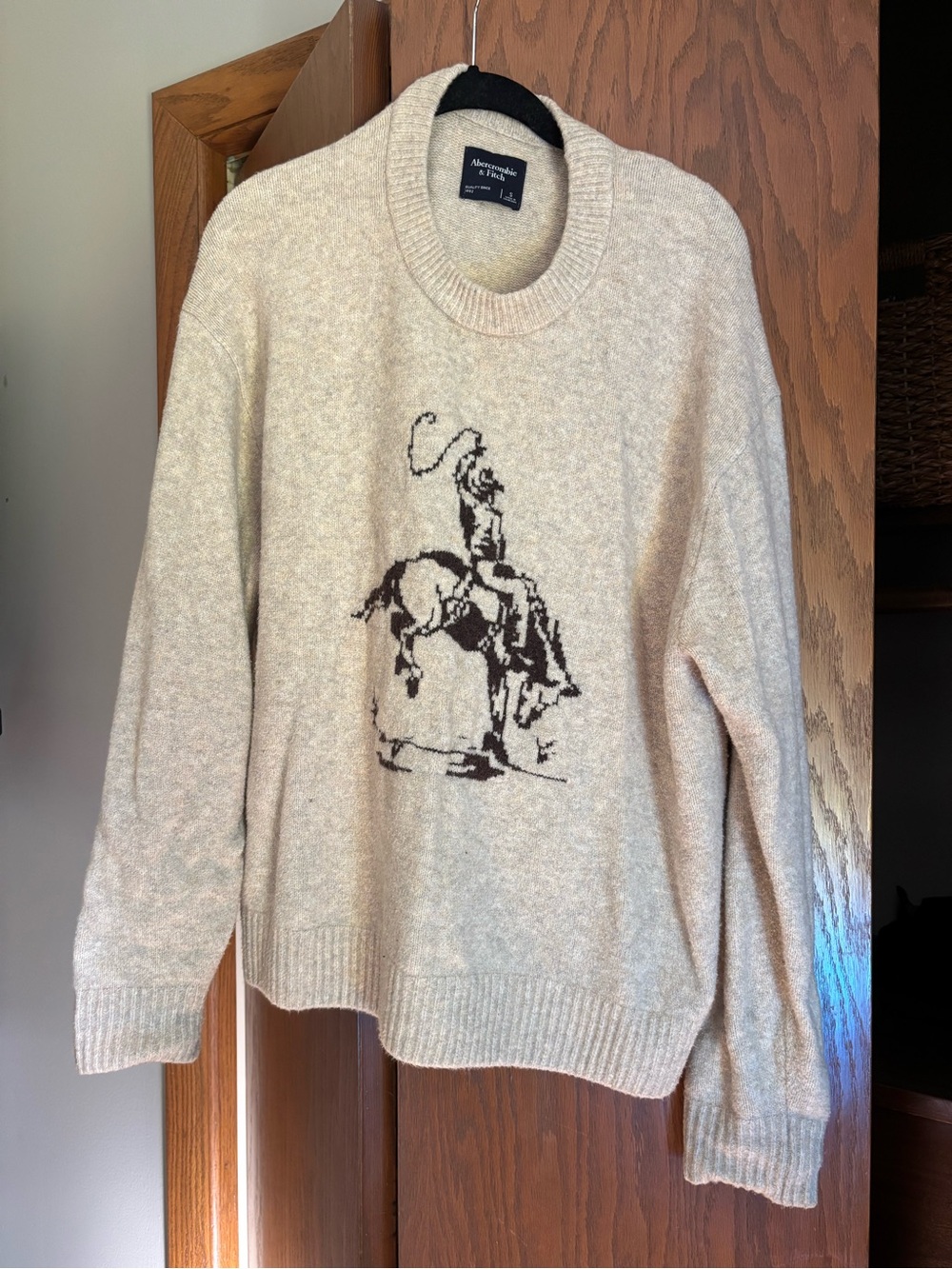 Abercrombie & Fitch Cream Crewneck Sweater with Brown Rodeo Graphic